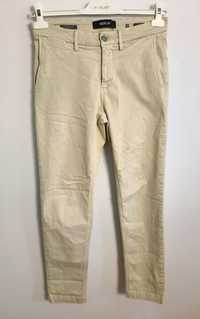 Męskie spodnie jeansowe chinos Replay  Benni Hyperflex Slim Fit W28 L3