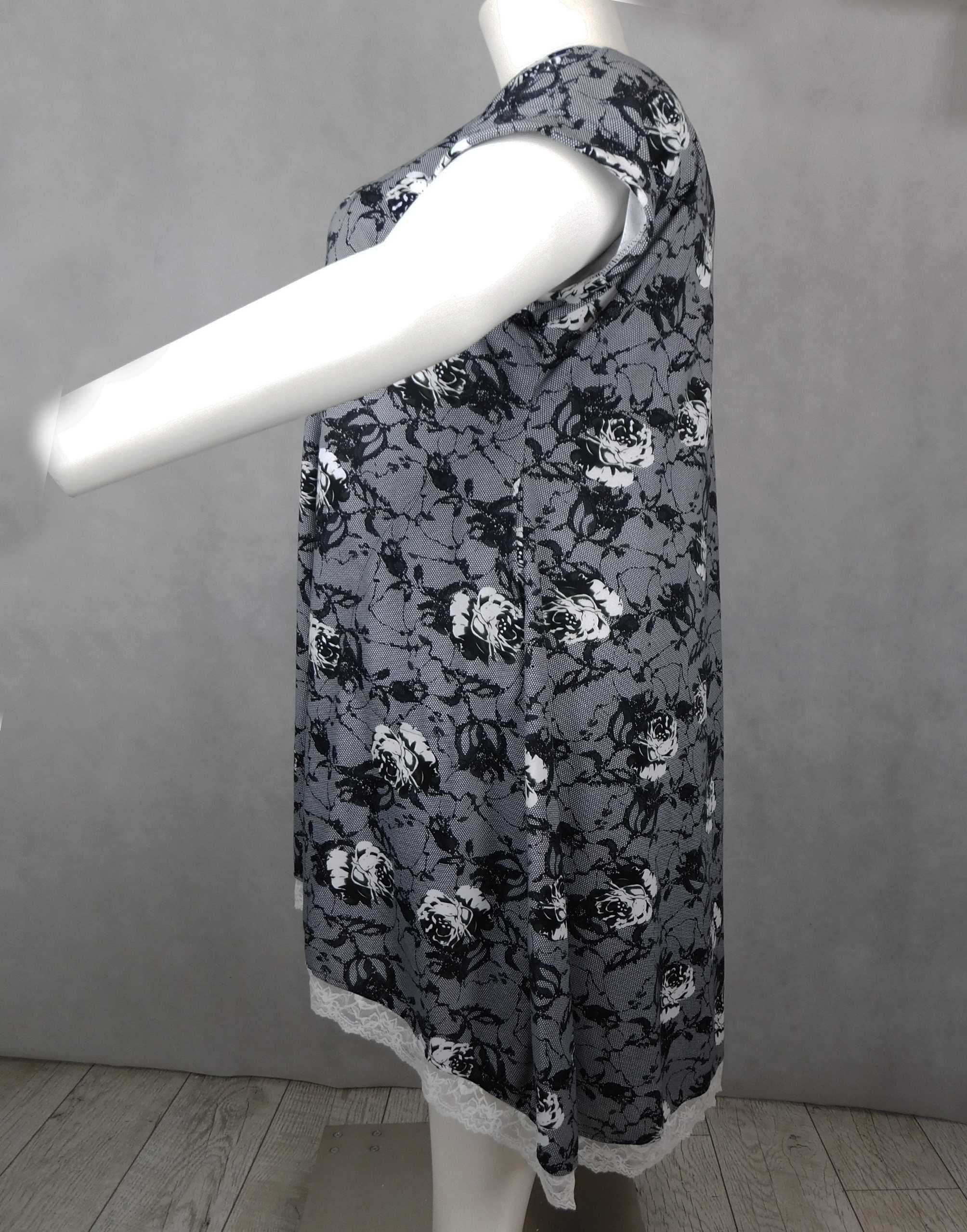 Sukienka elegancka z kieszeniami imitacja koronki XXXL - 60/62