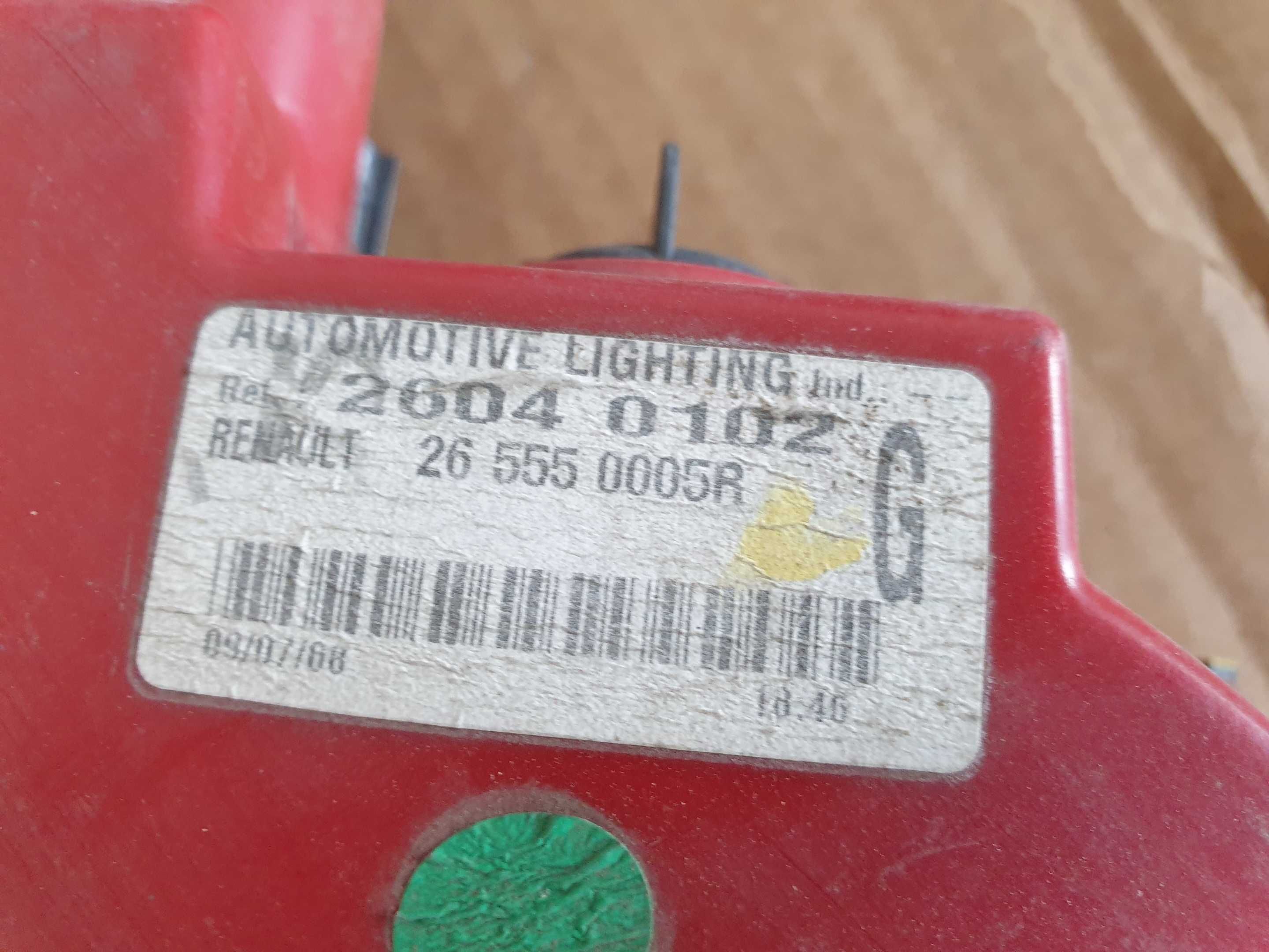 Renault laguna III 3 coupe lewa lampa tył tylna w błotnik