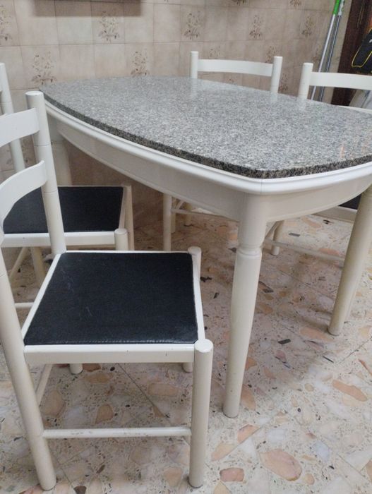 Mesa em granito com 4 cadeiras
