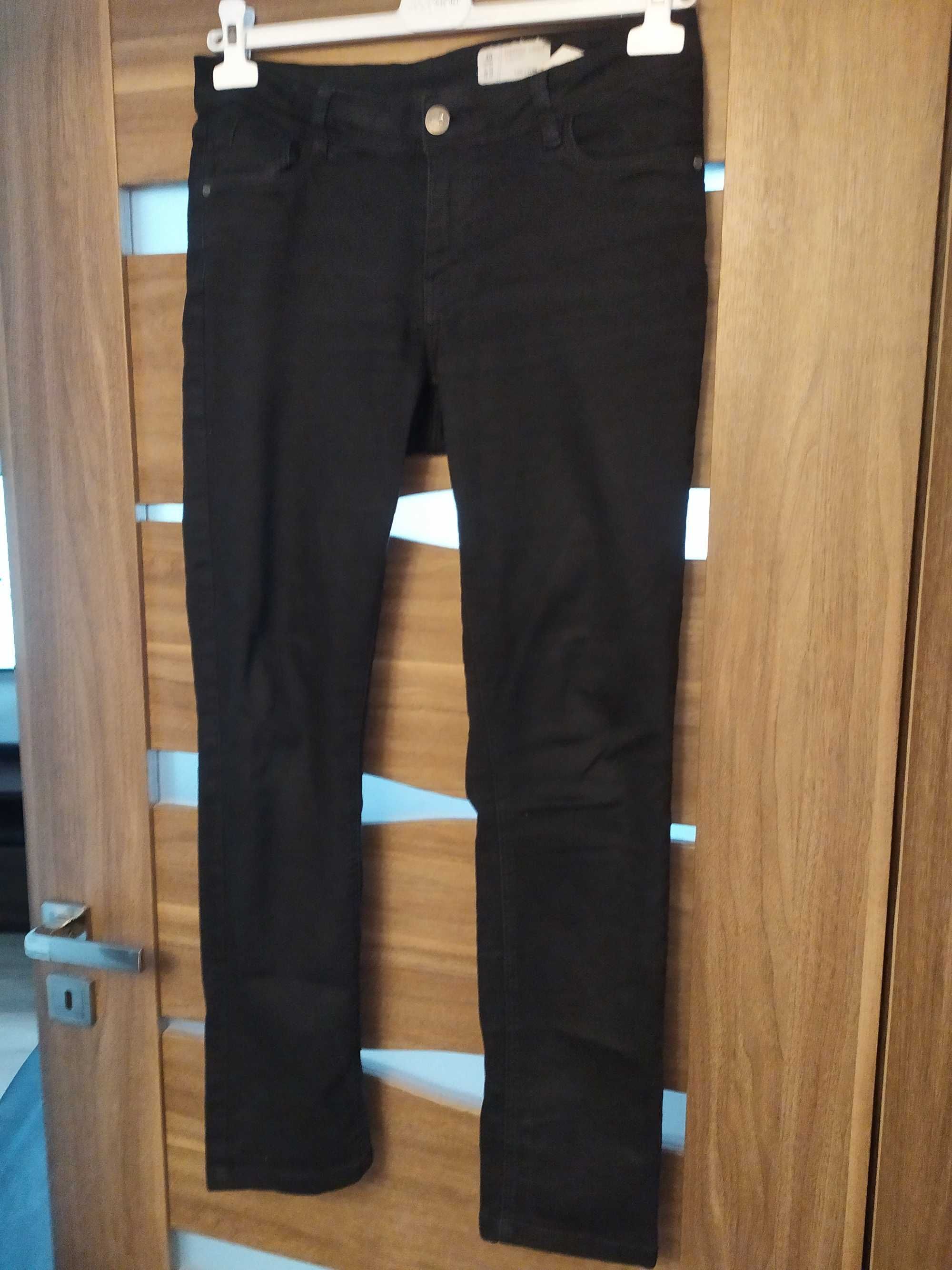 Czarne spodnie damskie denim 40 L slim długie jeansy rurki