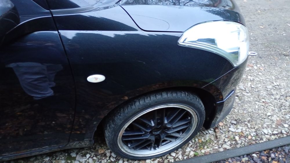 Suzuki Swift MK7 błotnik przedni prawy zce