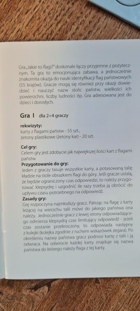 Dwie gry - dinozaurowe domino oraz Flagi