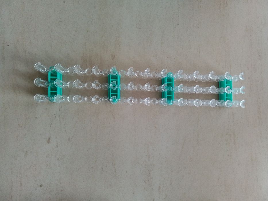 Kit elásticos para fazer pulseiras e outro