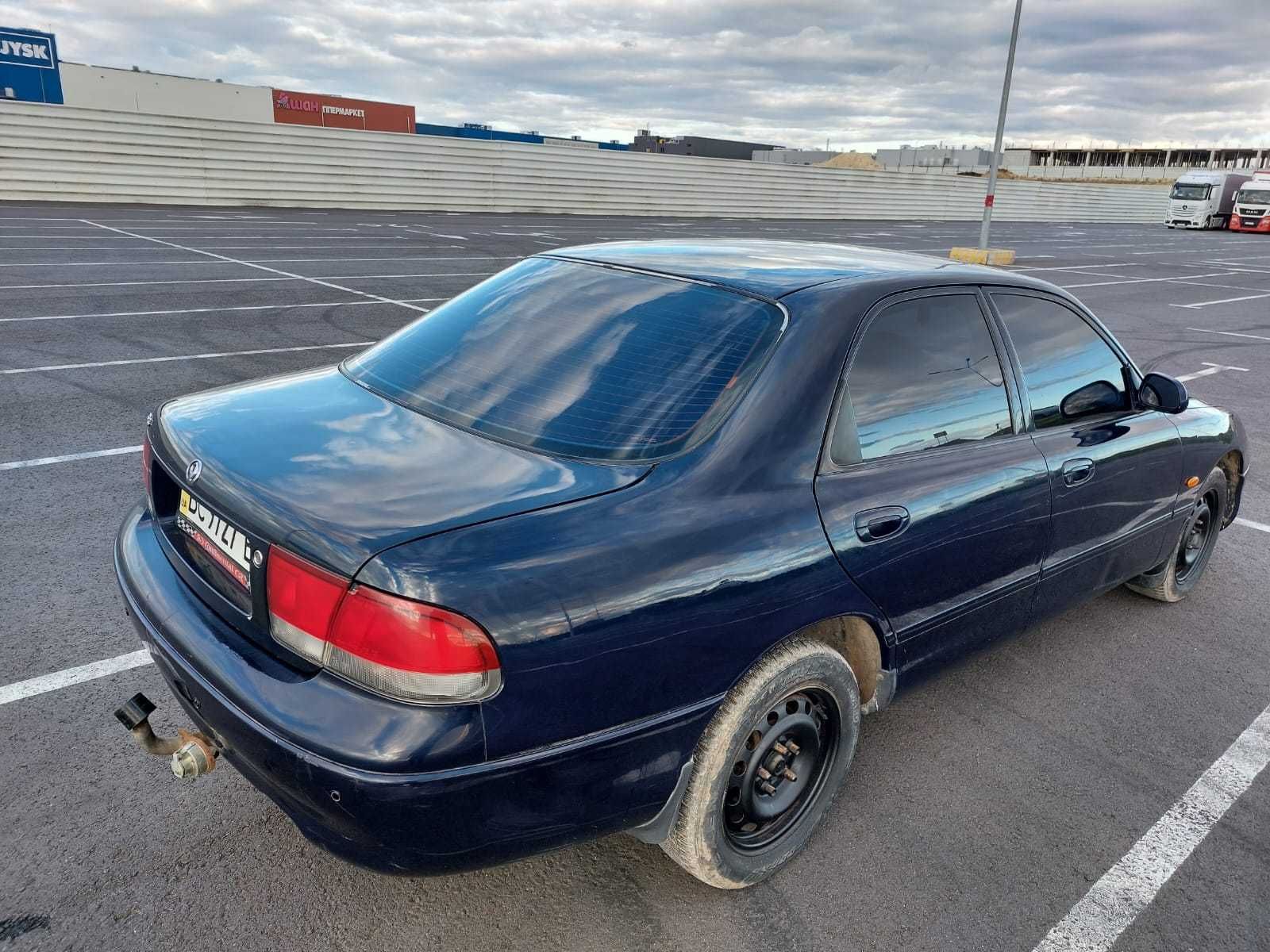 Мазда. Mazda 626 GE 1.8  1996