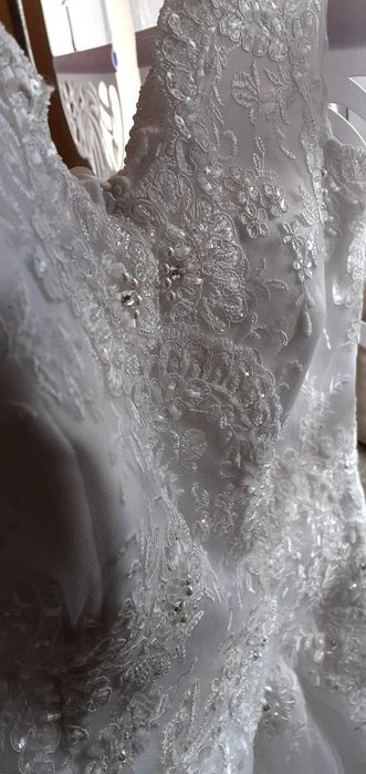 Suknia ślubna raz użyta