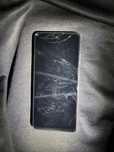 Motorola g24 z lekko peknietym ekranem w lewym gornym rogu