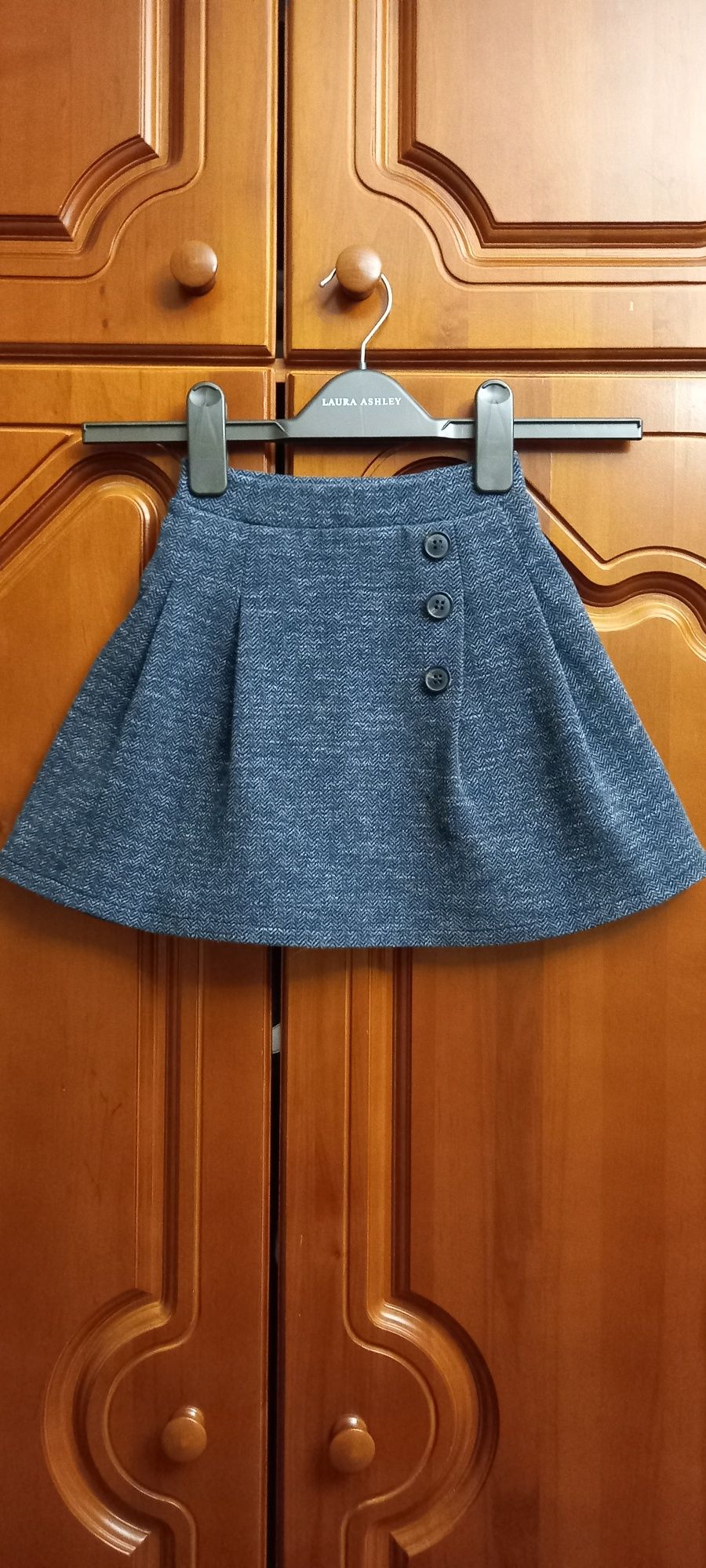 Симпатичная трикотажная юбка на девочку серого меланж цвета, р.116-122