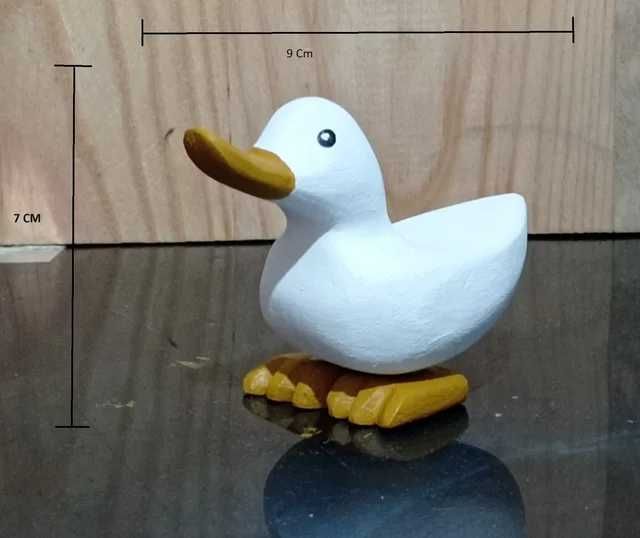 Conjunto de patos de madeira.