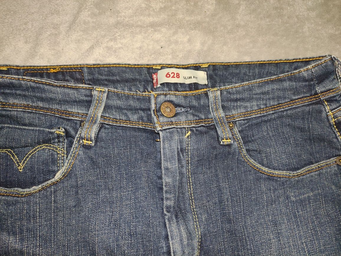 Levi's 31/30  założone 1 raz.dżinsy jeans W31 L 30 stan super. Slim  f