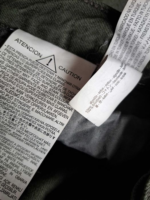 Oliwkowe szerokie jeansy Zara rozm. 42