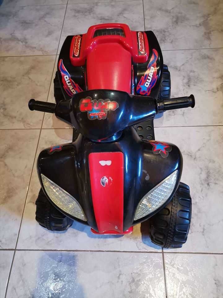 Moto de quatro rodas para criança