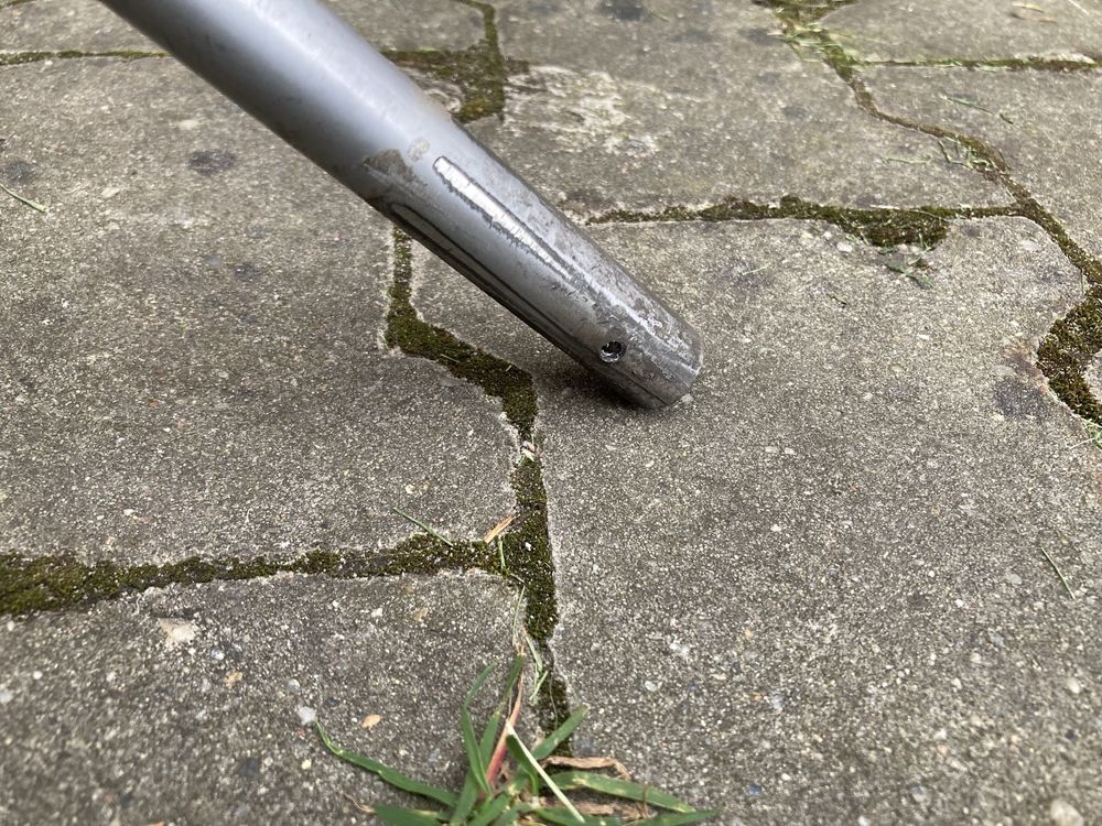 Uchwyt kosiarki elektrycznej