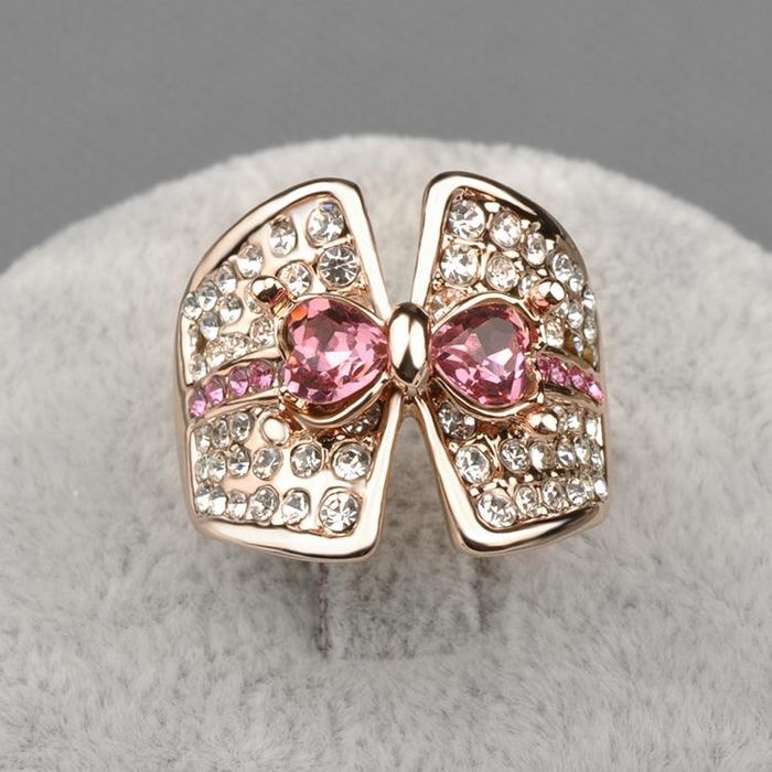 Кольцо, позолота розовым золотом, цирконы, "Бантик"