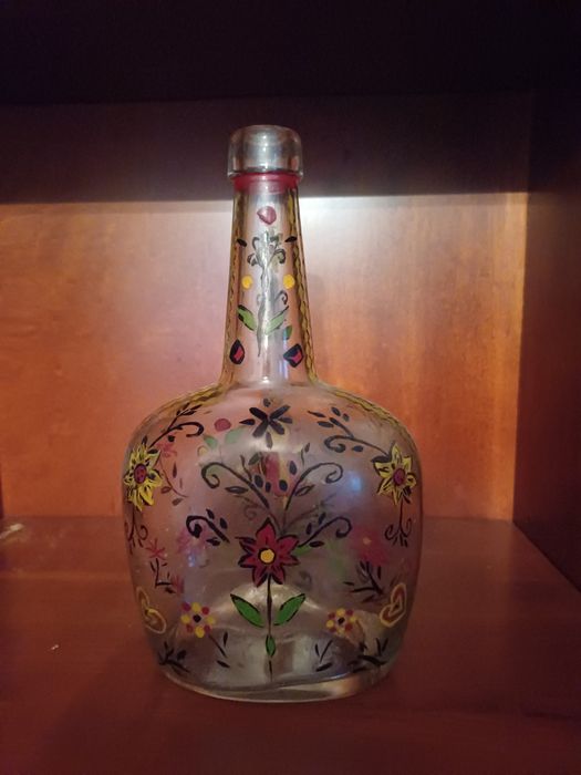 Garrafa de vidro antiga pintada à mão