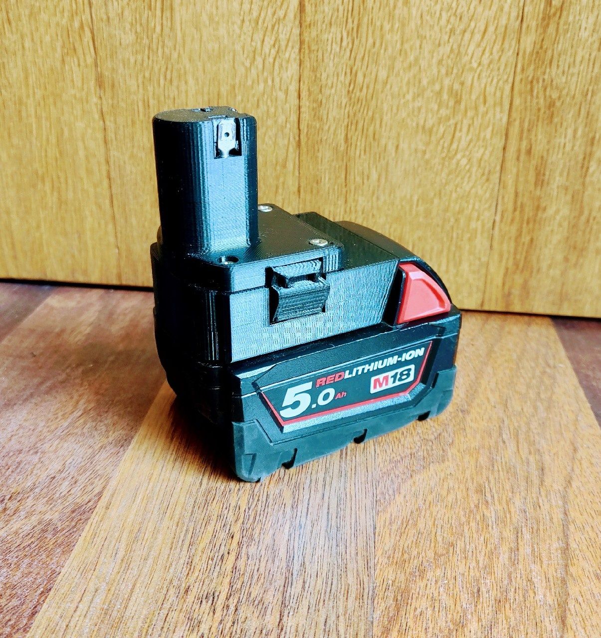 Adapter baterii Milwaukee M18 do Ryobi One+