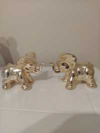 Figurki złote słonie z uniesioną trąbą