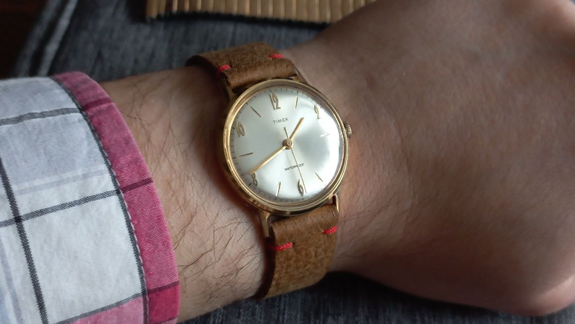 Sprzedam pozłacany męski zegarek Timex na pasku i z bransoletą