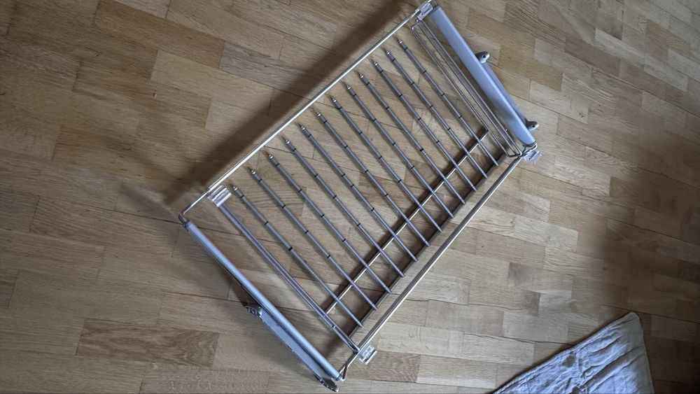 Висувна вішалка для брюк