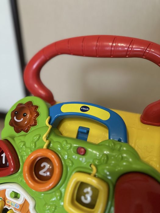 Дитячі ходунки Vtech з ігровою панеллю/толокар