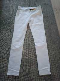 Białe eleganckie spodnie M