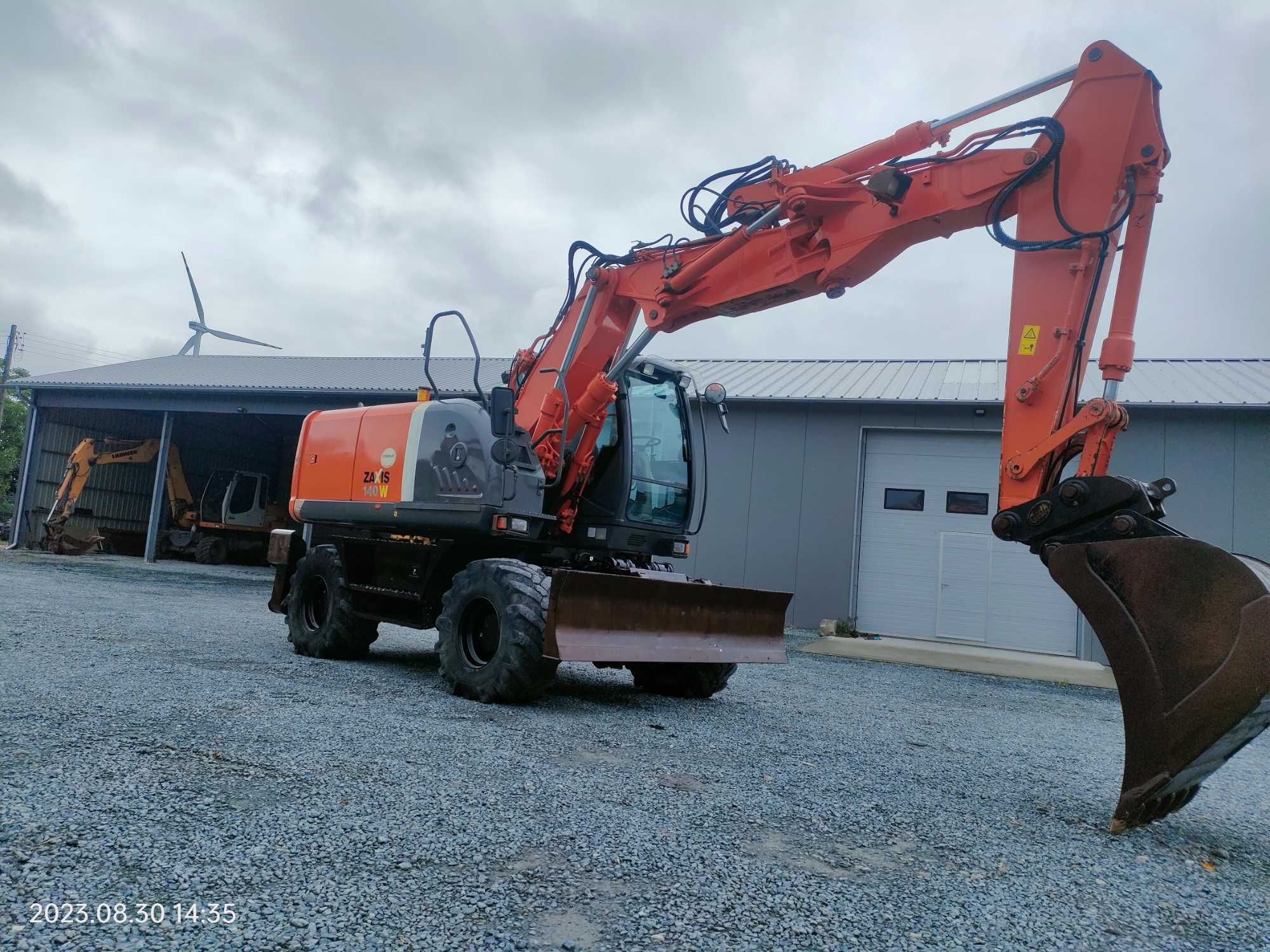 Koparka kołowa Hitachi Zaxis 140 W(cat,liebherr) W rok 2011