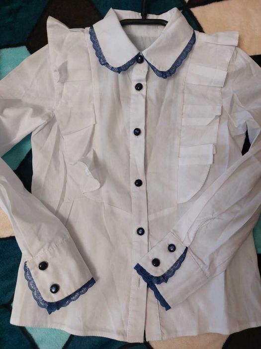 Продам наши школьные рубашки 128-134