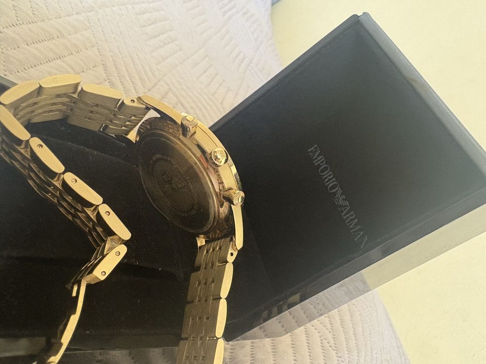 Zegarek zloty Emporio Armani z fabryczna folia od wewnątrz