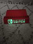 Stojak podstawka na gry Nintendo Switch napisy fluorescencyjne