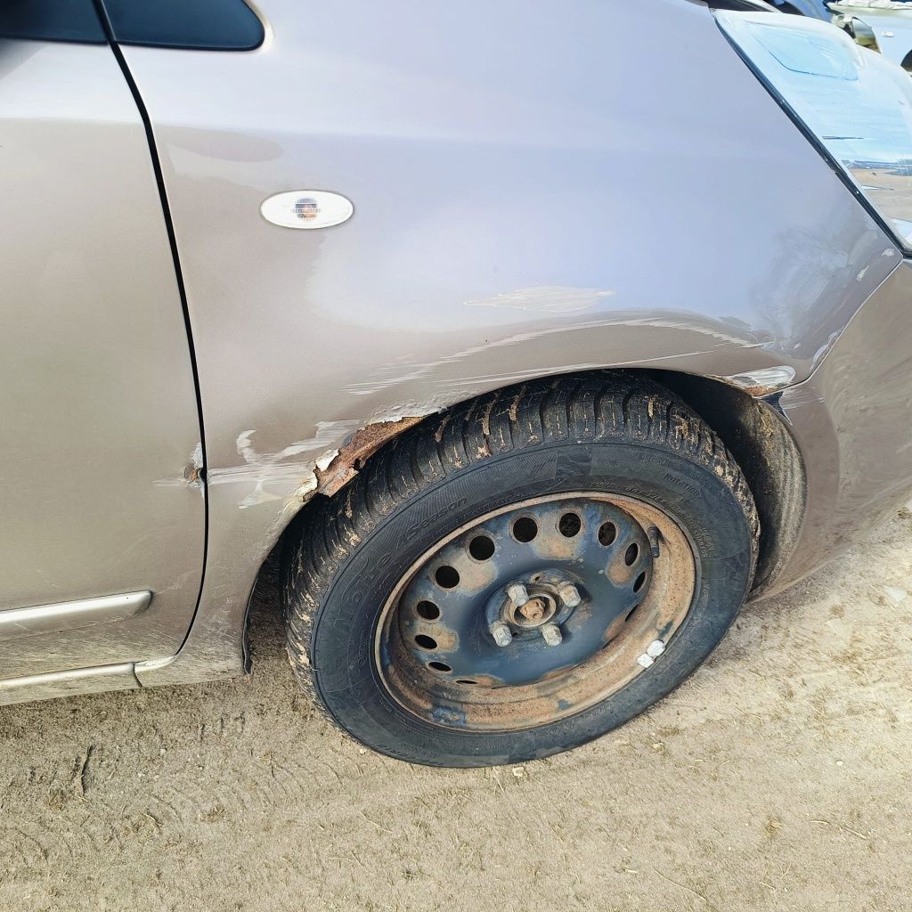 Nissan note1.4i  2009r kolor C30G na części