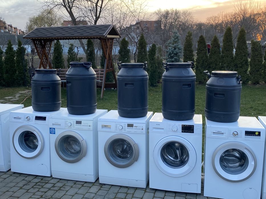 Пральна машина з бочкою баком