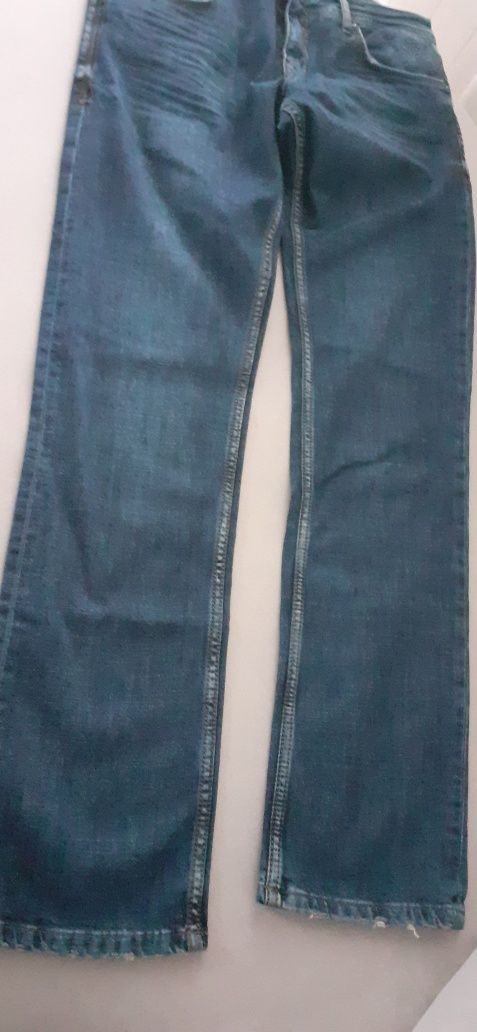 Spodnie jeansowe rusty neal premium męskie nowe