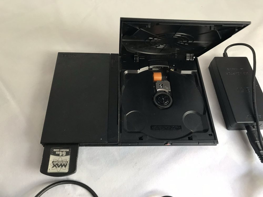 Ps2 Slim + Comando + eye toy + cartao memoria 64Gb impecavel