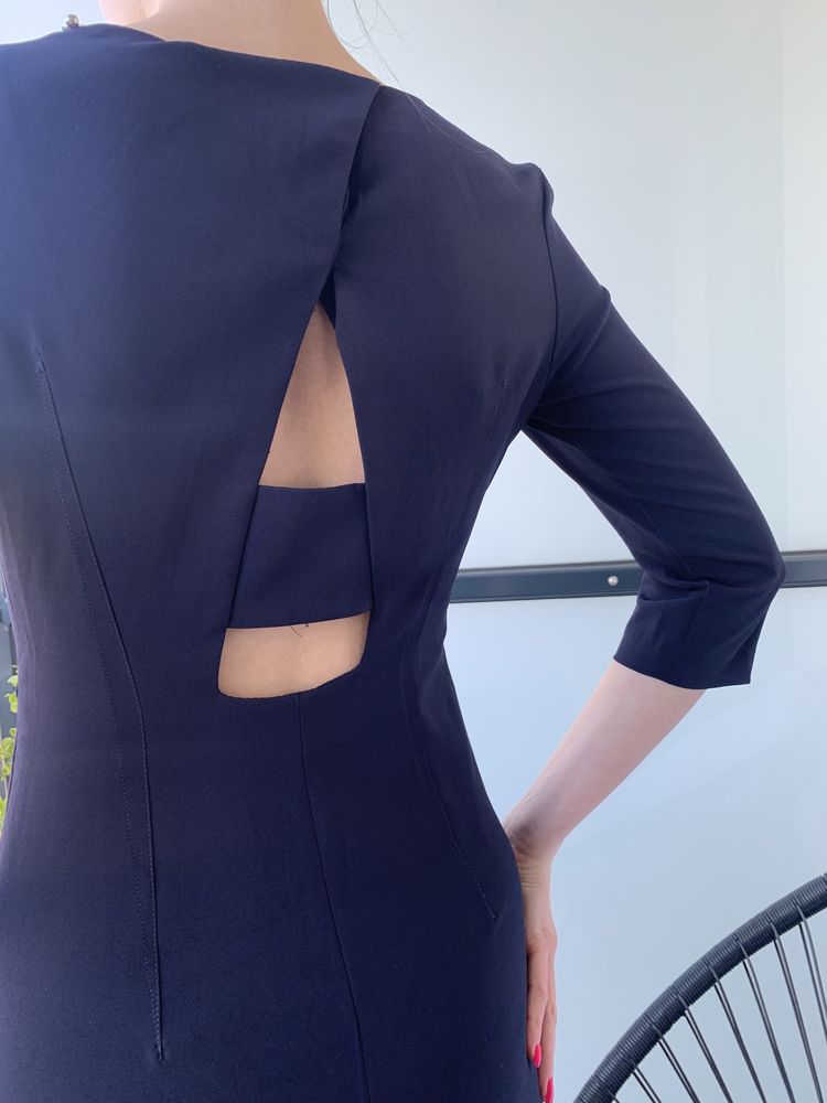 Elegancka sukienka z lekkim wycięciem na plecach