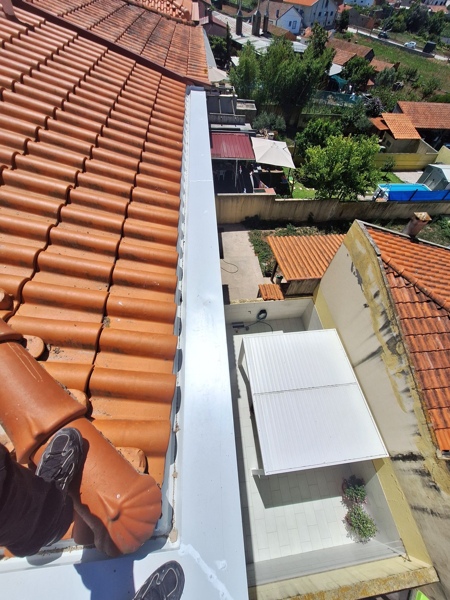 Caleiras e telhados