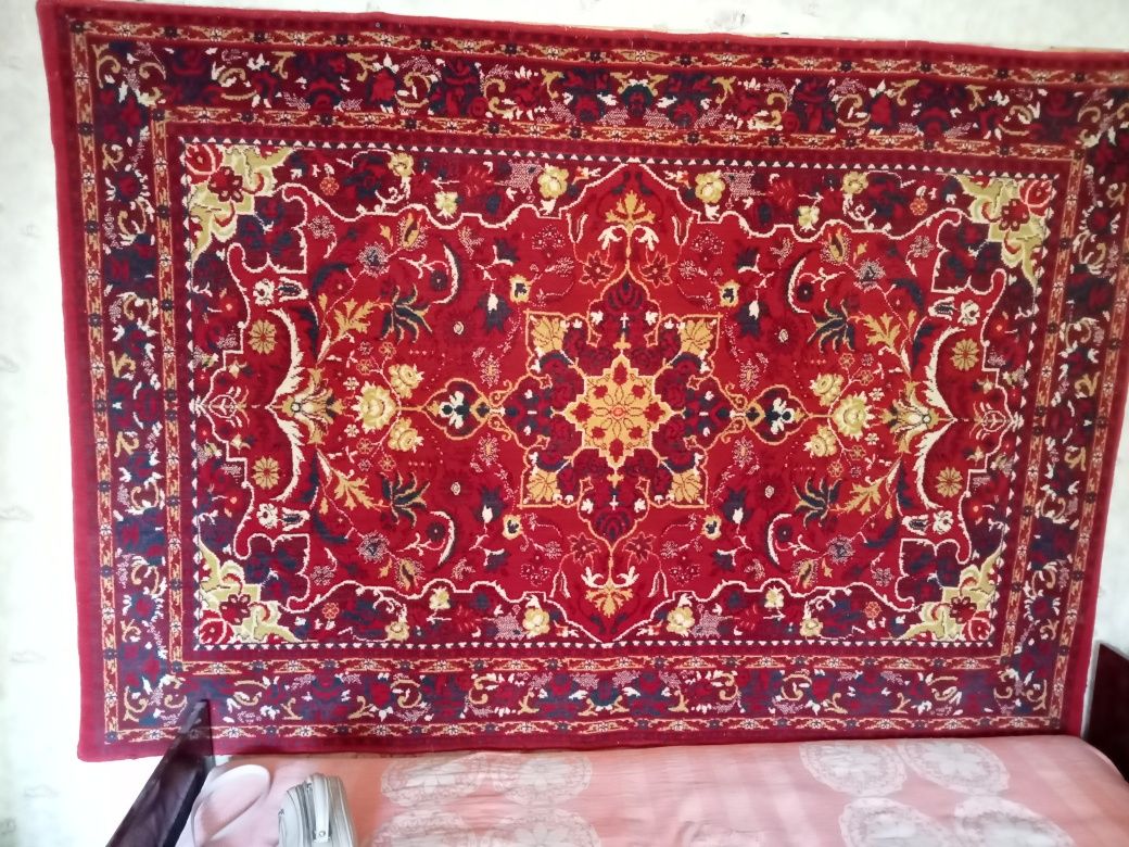 Шерстяной ковер.
