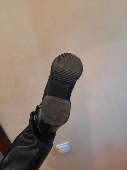 Шкіряні чоботи, високі