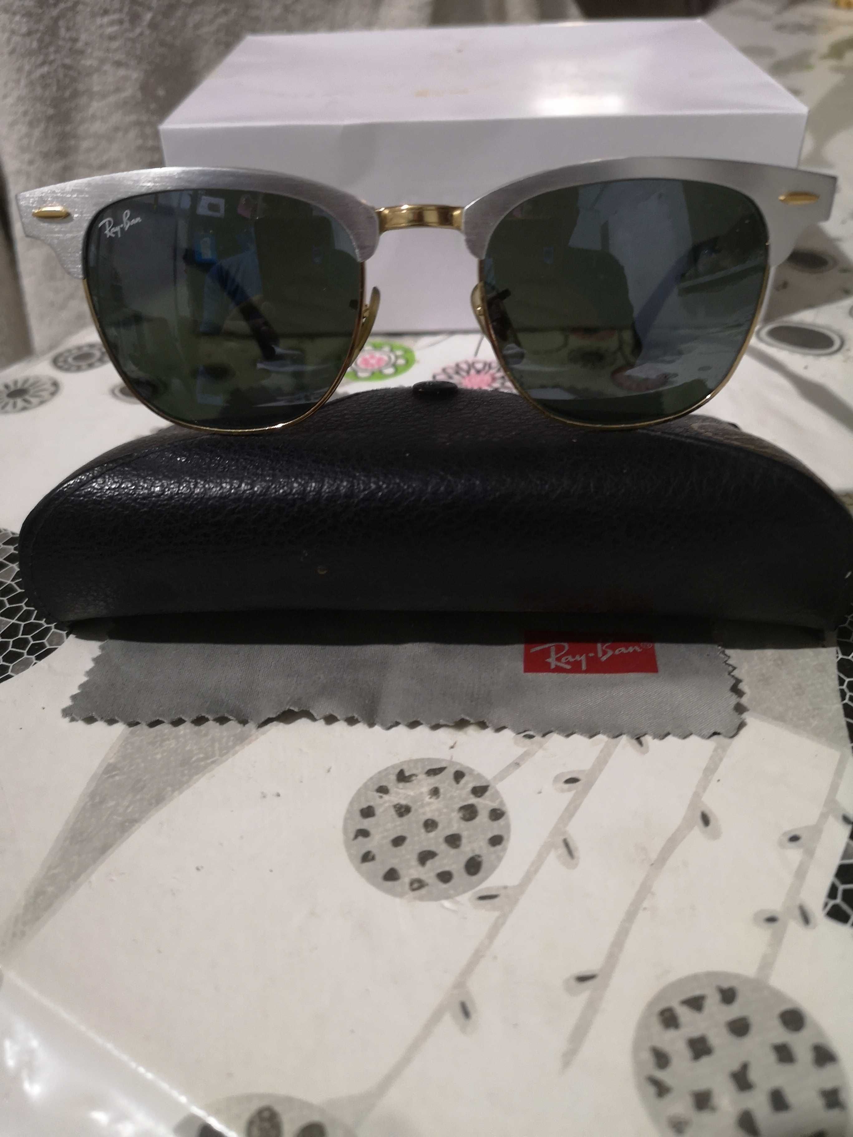 Óculos Ray-Ban prateado e dourado