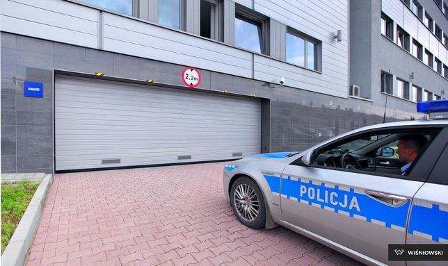 Brama garazowa segmentowa do POLICJI STRAŻY WARSZTATU Wiśniowski