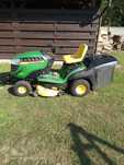 Traktorek  John Deere X166R + pług do śniegu i łańcuchy