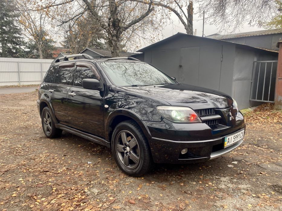 митсубиси Аутлендер 2.4 газ бензин автомат