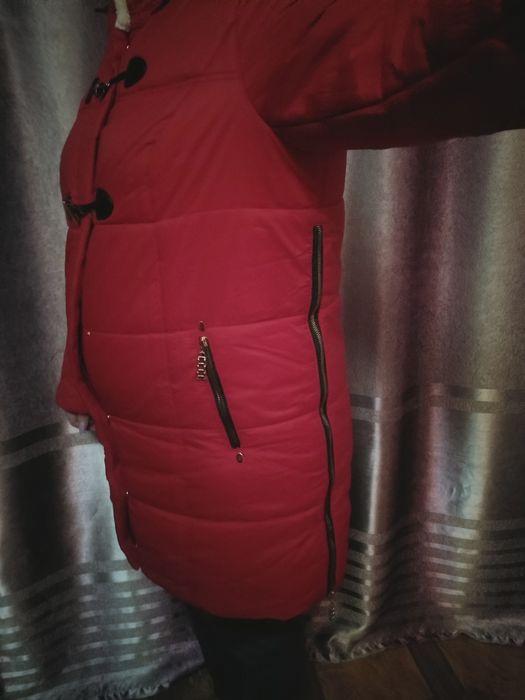 Пуховик теплый Продам