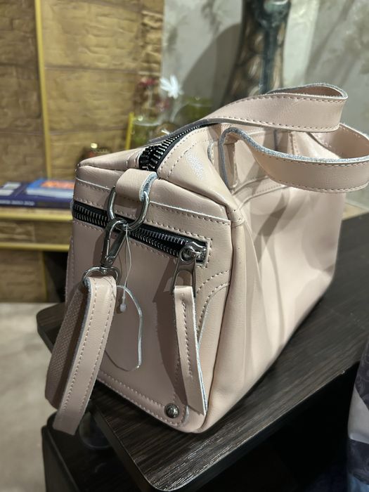 Кожаная сумка розовая