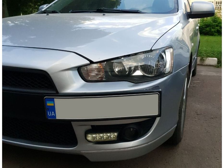 Mitsubishi Lancer X Подиум под номер черный мат