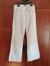 Spodnie białe jeansy dzwony