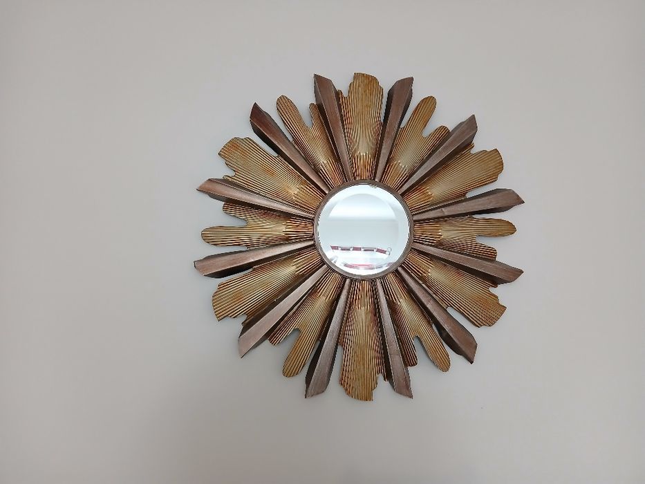 Espelo em forma de sol