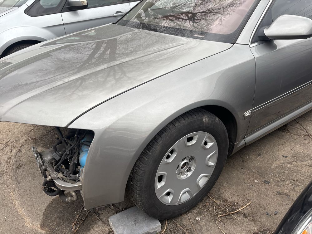 Audi A8 D3 błotnik L P