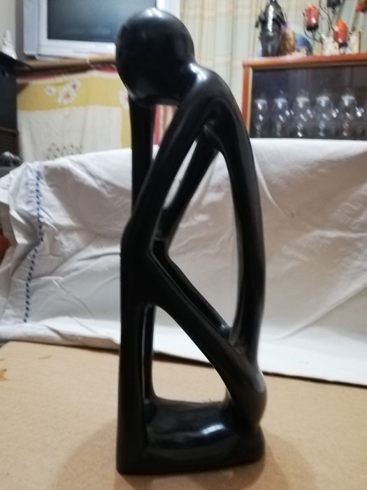 Estatueta pedra preta