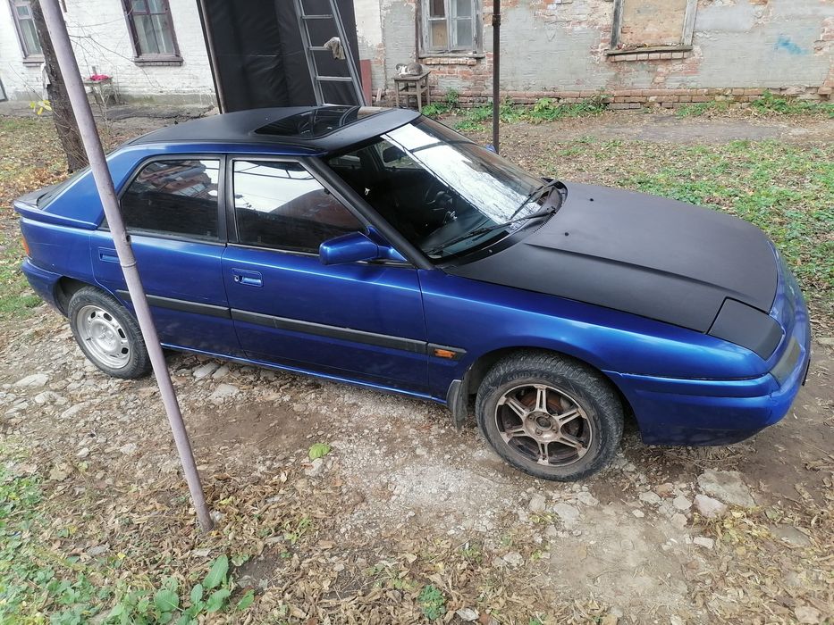 Мазда - 323  Сліпа 1.6-16v