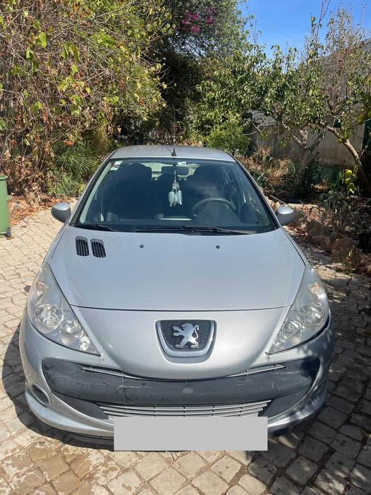 Peugeot barato e com algum uso.